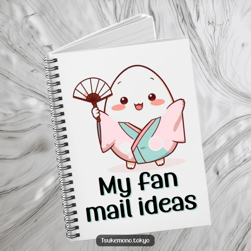 Funny notebook cover featuring a plump onigiri character in a small kimono cheerfully waving a tiny fan.